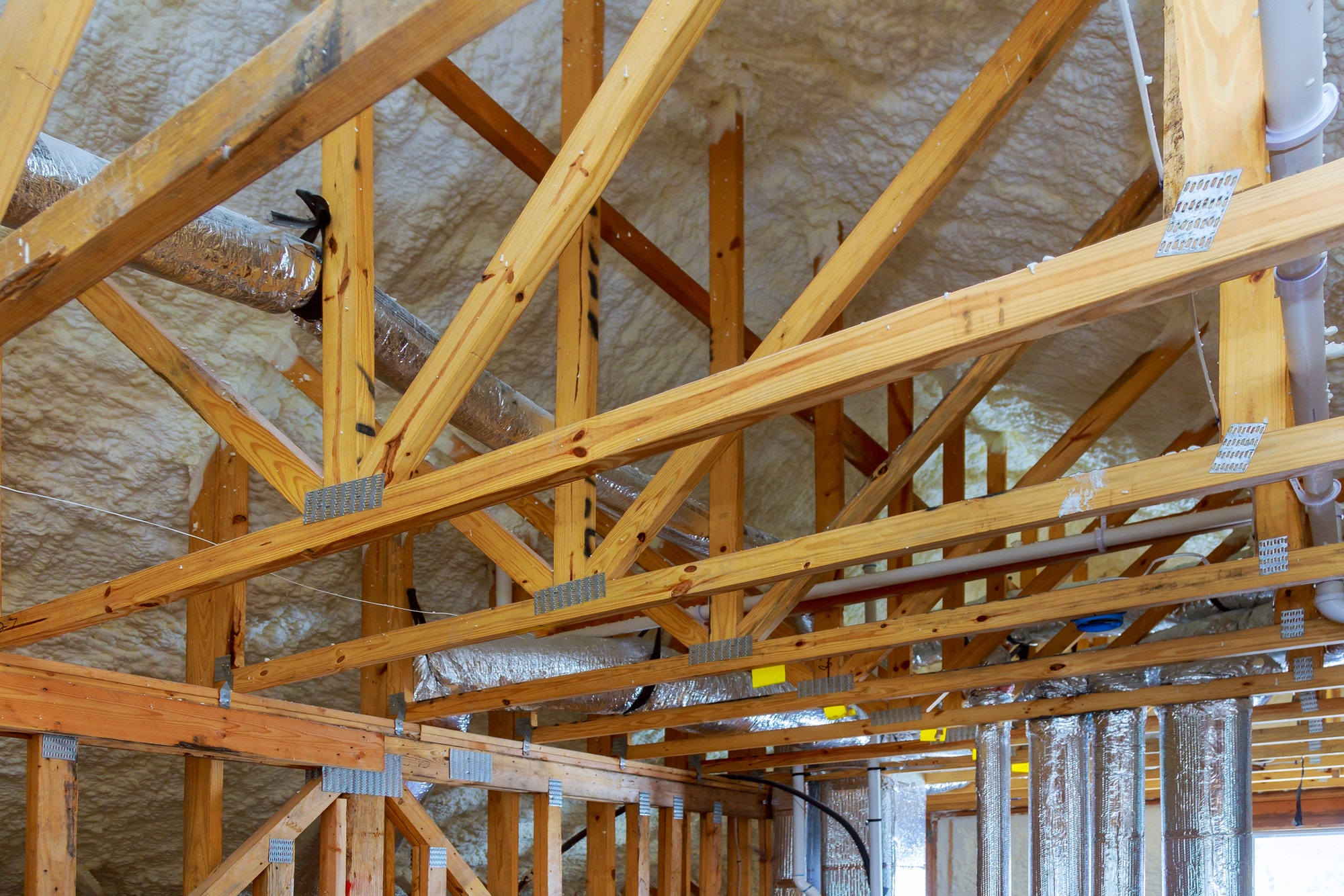 Spray foam insulation installation in a small space